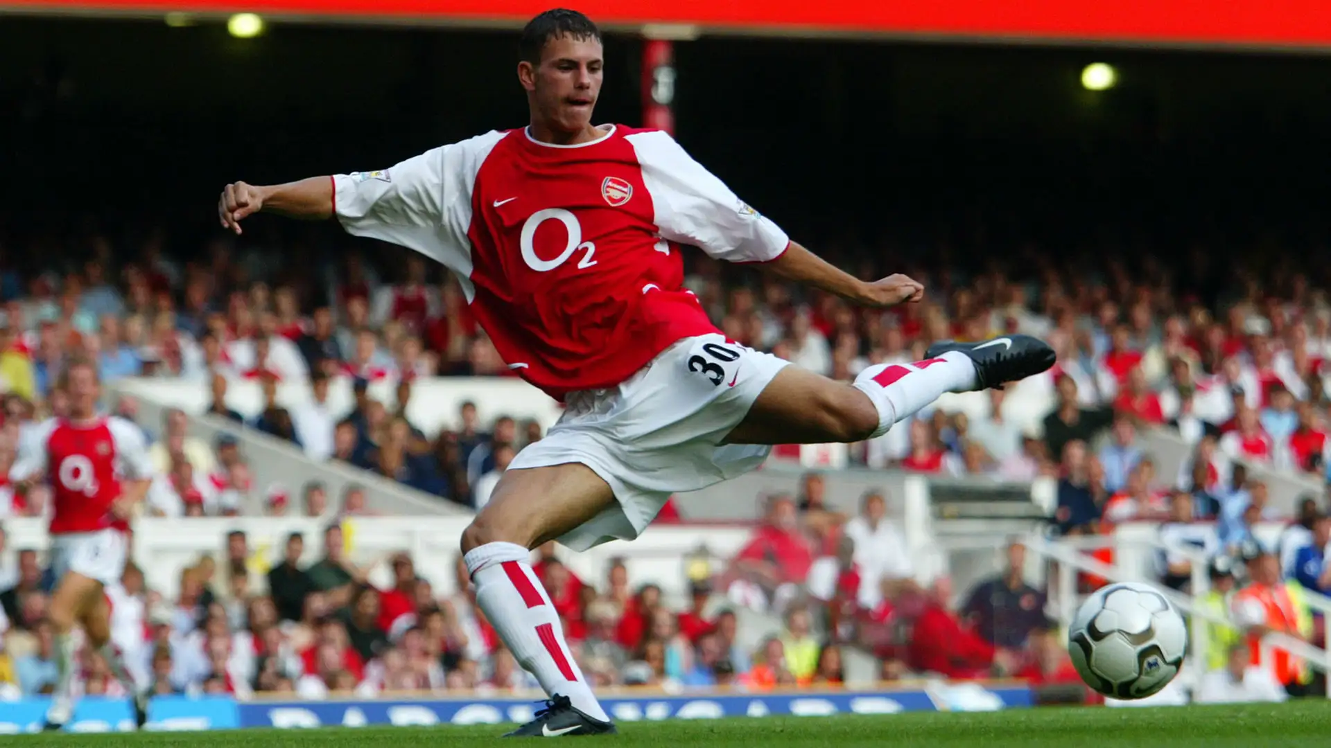Jérémie Aliadiére playing for Arsenal about to kick the ball.